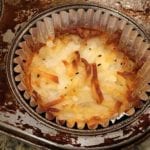 Close-up of pressed potatoes in foil baking cup