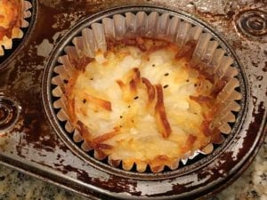 Close-up of pressed potatoes in foil baking cup