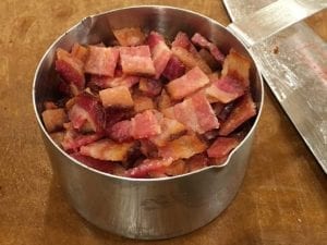 9 slices of chopped bacon in measuring cup