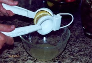 Squeezing lemons for juice