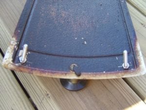 Screws and nuts installed on access door