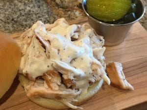 Close-up of white sauce on chicken sandwich