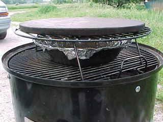 Pizza stone on BGE grill extender with pan