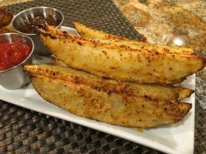 Barbecue parmesan potato wedges ready to eat