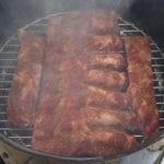 1 slab of ribs plus trimmings on the bottom cooking grate