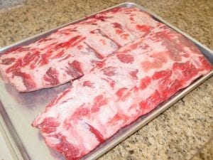Two slabs of raw beef back ribs