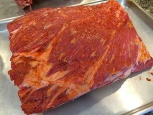 Louisiana hot sauce rubbed onto short ribs