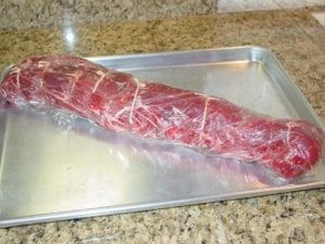 Trimmed, tied, and salted whole beef tenderloin
