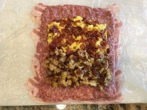 Stuffing placed on top of sausage layer