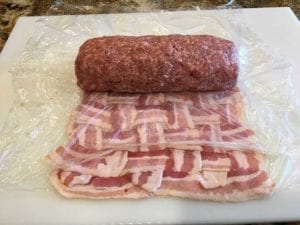Checking stuffed sausage log for length