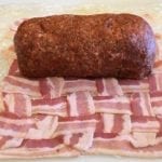 Ready to wrap bacon weave around rubbed sausage log