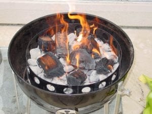 Smoke wood engulfed in flames