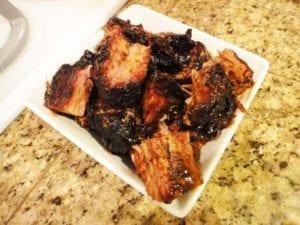 Burnt ends mixed with barbecue sauce/au jus mixture