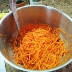 Grated carrots tossed with lemon juice