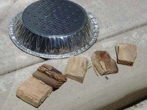Perforated pie tin and smoke wood