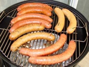 Sausages after cooking on the top grate