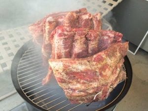 Beef ribs go into the WSM