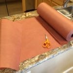 Preparing pink butcher paper