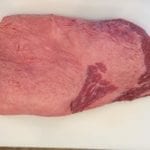 Untrimmed fat side of brisket flat