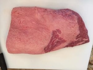 Untrimmed fat side of brisket flat