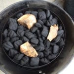 Unlit Kingsford charcoal with pecan chunks