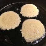 Cooking three hoecakes on first side