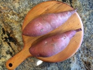 Two unpeeled yams