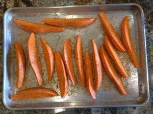 Wedges sprinkled with rub mixture