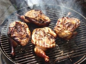 Crisping chicken over direct heat.