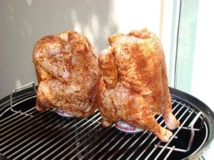 Chickens go into the WSM on the top cooking grate