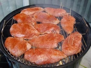 Breasts go into the smoker