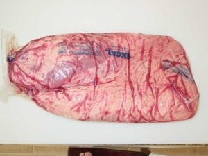 Whole brisket in Cryovac, point side facing up