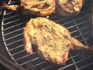 Chicken flipped over and basted