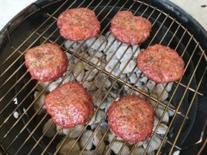 Finishing burgers over direct heat