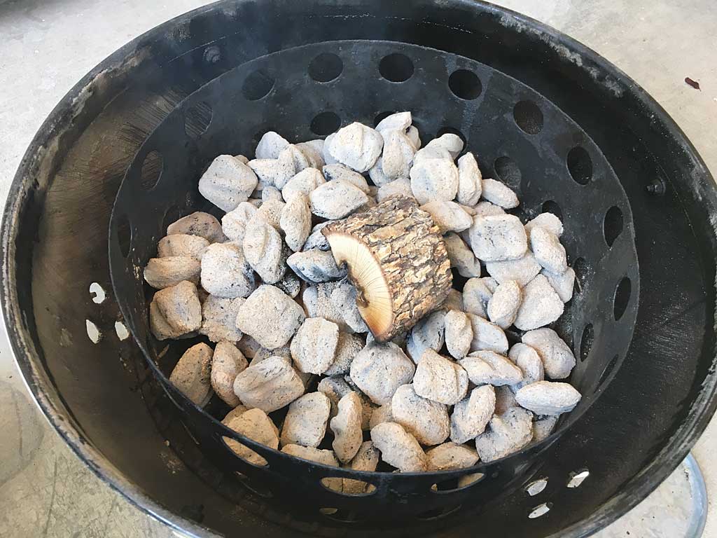 Hot charcoal with smoke wood on top