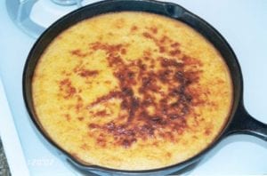 Cast iron skillet of Bacon Cheddar Cornbread