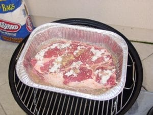 Chuck roast goes into the cooker