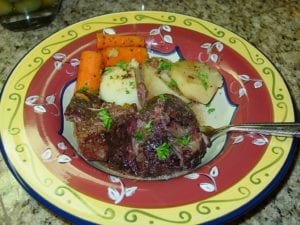 Chuck roast, potatoe, and carrots plated