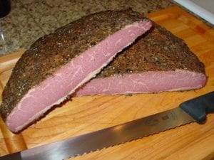 Smoked pastrami cut in half