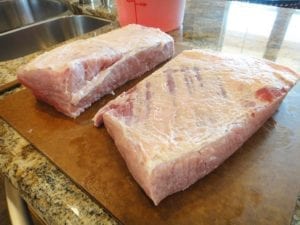 Soaked corned beef brisket flats patted dry and ready for rub