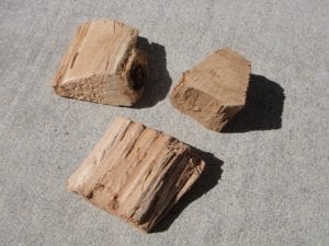 Three chunks of pecan smoke wood