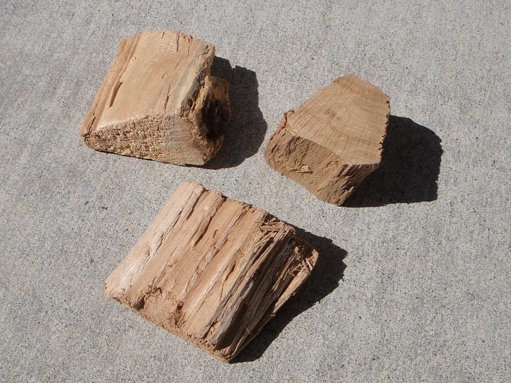 Three chunks of pecan smoke wood