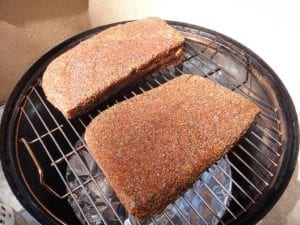 Rubbed corned beef goes into the WSM