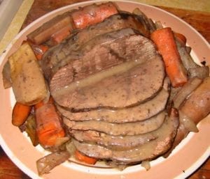 Sliced moosemeat roast with vegetables
