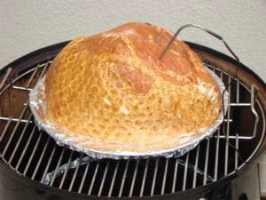 Half ham going into the Weber Bullet
