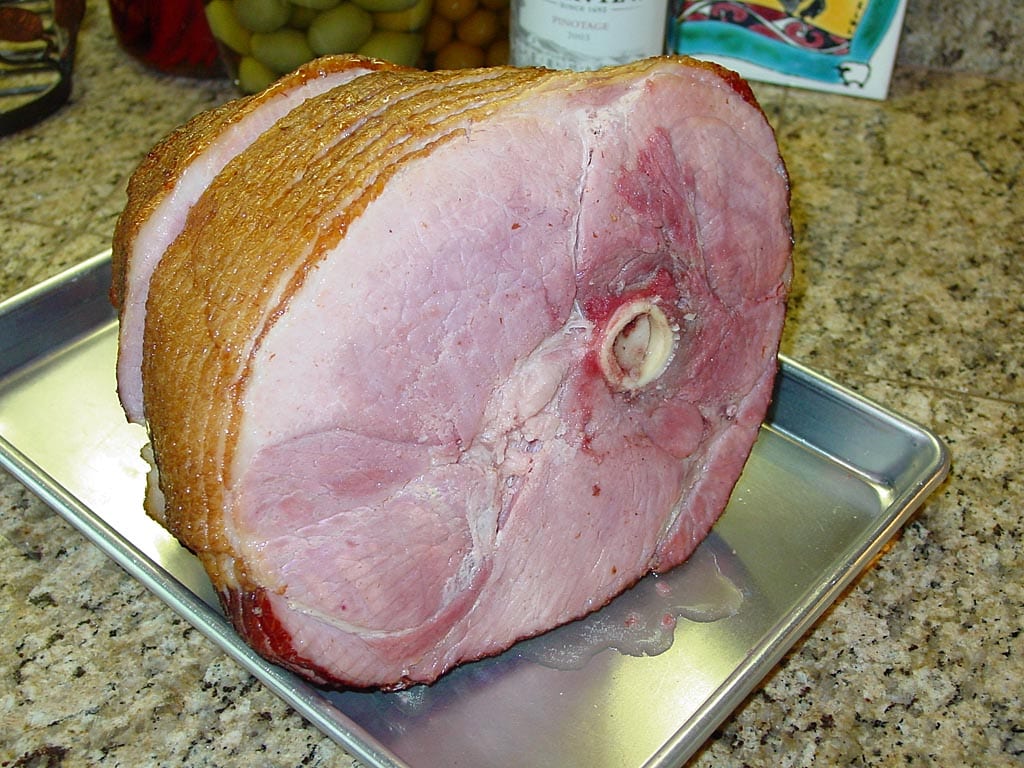 Ready to remove slices from face of ham