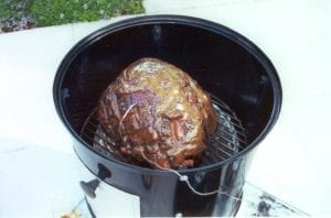 Adding glaze to ham