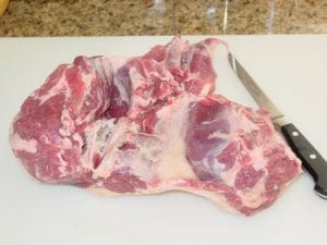 Lamb unrolled on cutting board