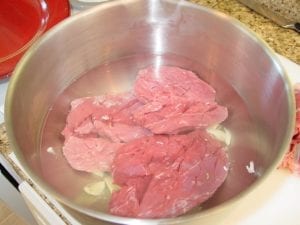 Lamb in flavor brine solution