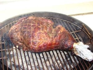 Searing leg of lamb directly over hot coals